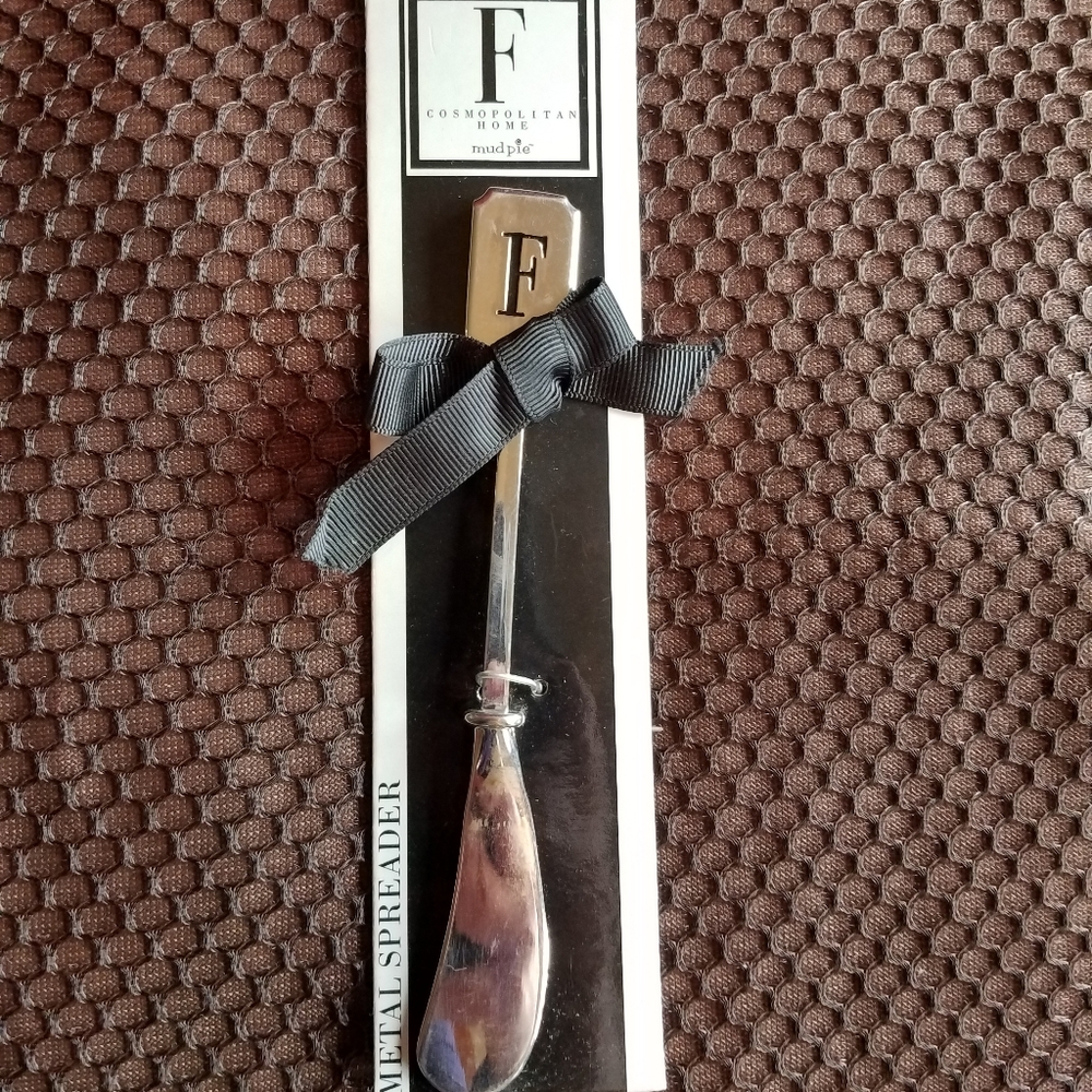 Initial F spreader